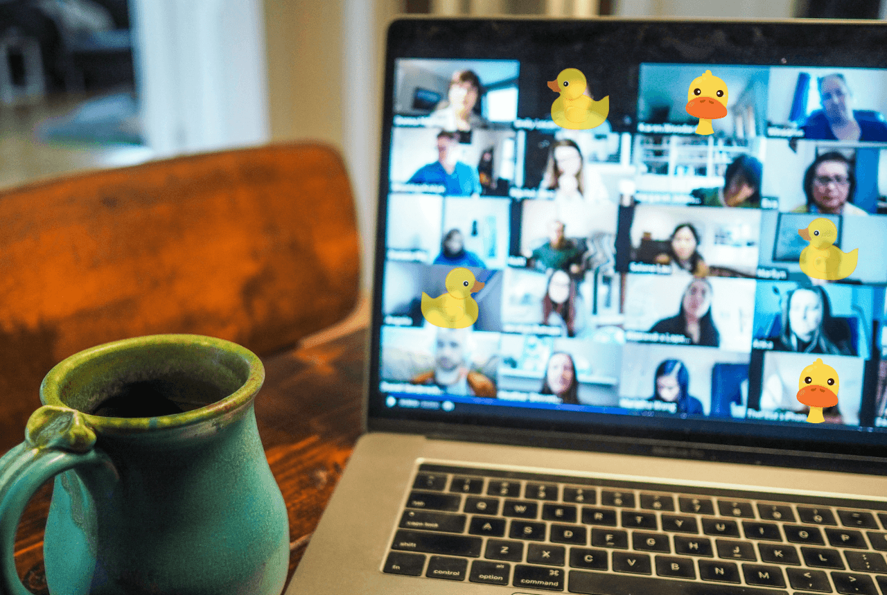 Zoom meeting on laptop with plastic duck particpants